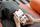 Image of someone holding a mobile phone browsing the karndean website